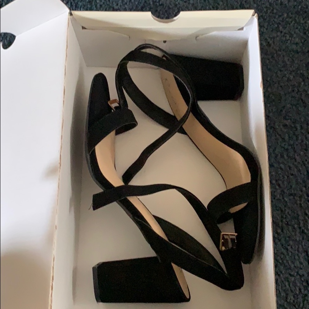 Simple black strap heel